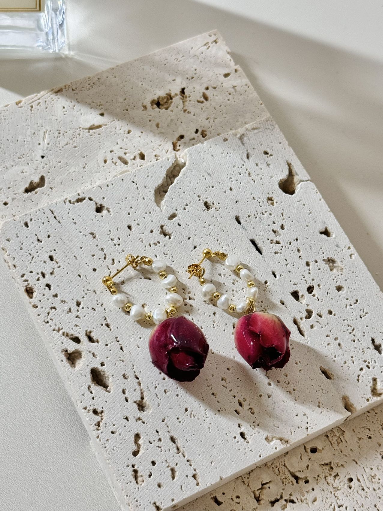 Pearlescent Bloom: Freshwater Pearl Loop Earrings with Dangling Roses